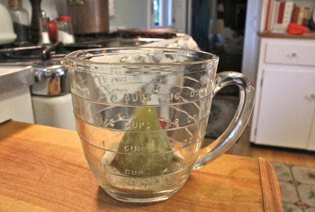 measuring cup candle holder